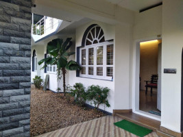 The Capitol Homestay and Cottages Image